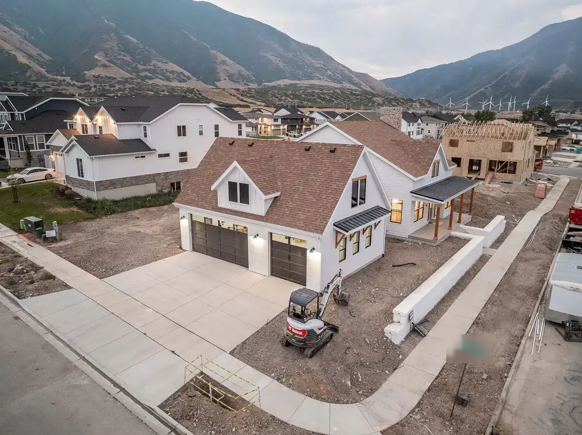 A DZYN Builds home in Mapleton during construction, mountains behind
